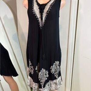 Black Sleeveless Dress with White Embroidery